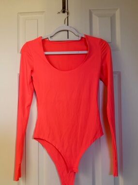 Neon orange pink bodysuit